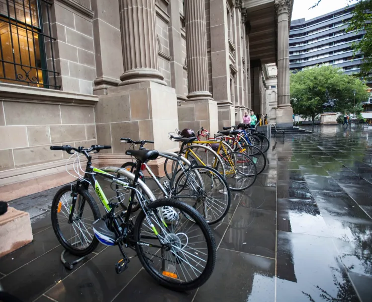 Bikes parked outside a building.