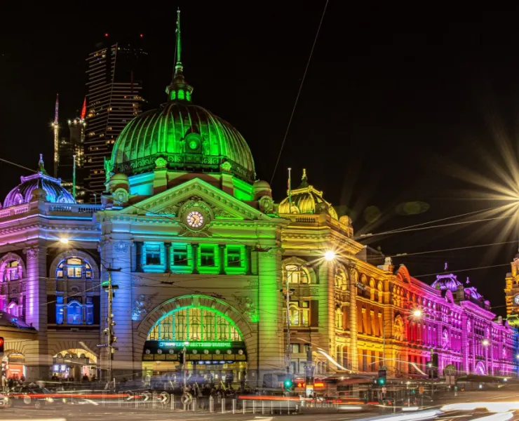 Flinders Street station lit up at night