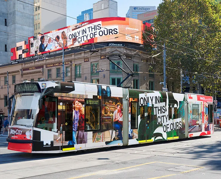 Decorated tram on city street