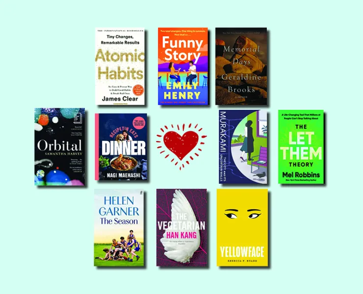 Compilation of books on a blue background with a heart in the centre