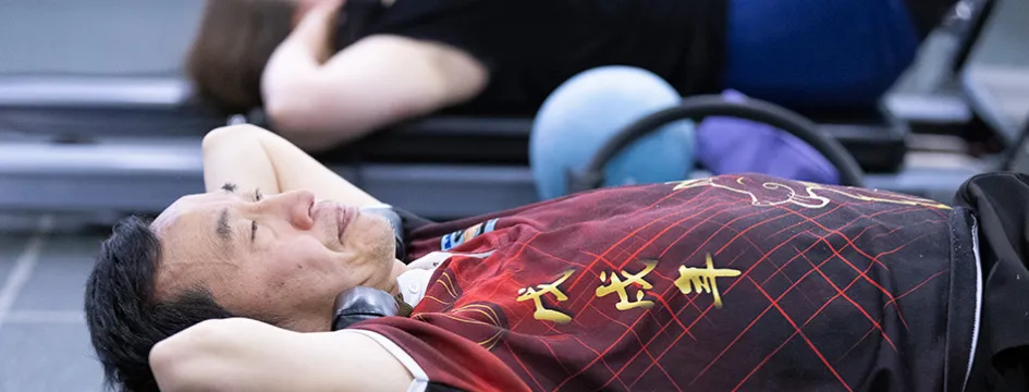 A man using gym equipment.