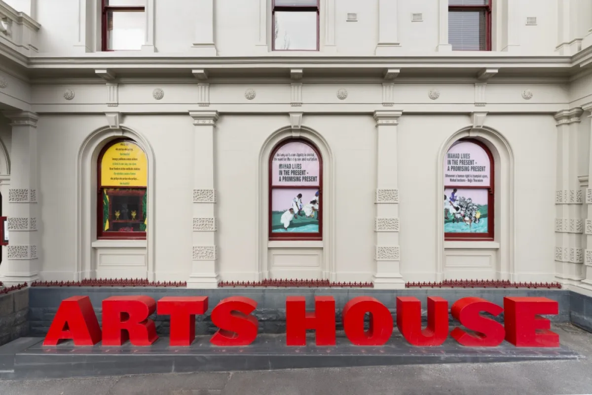 3D letters reading Arts House outside a building with arch windows