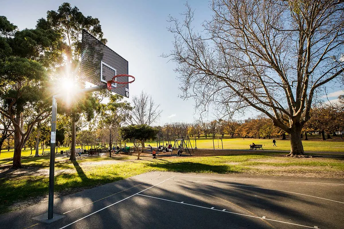 A basketball court in a park