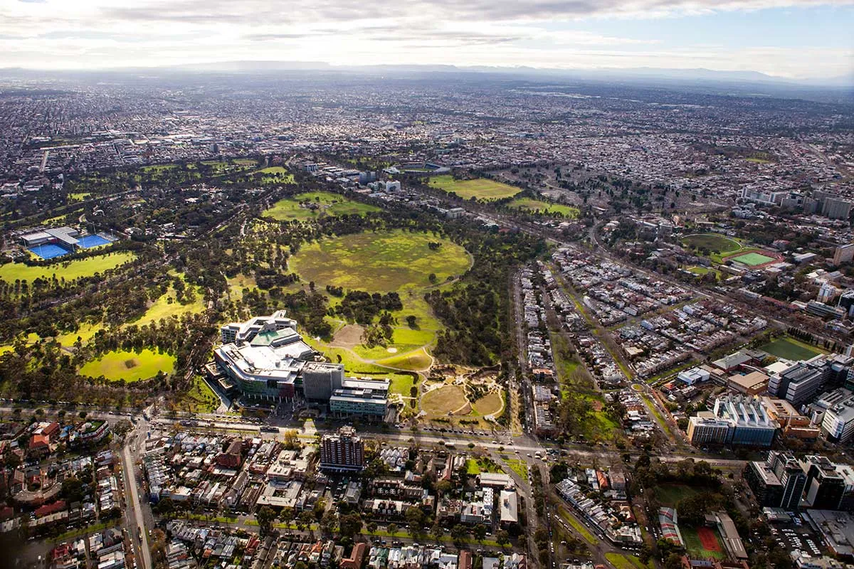 Birds-eye view of parkland, streets and houses